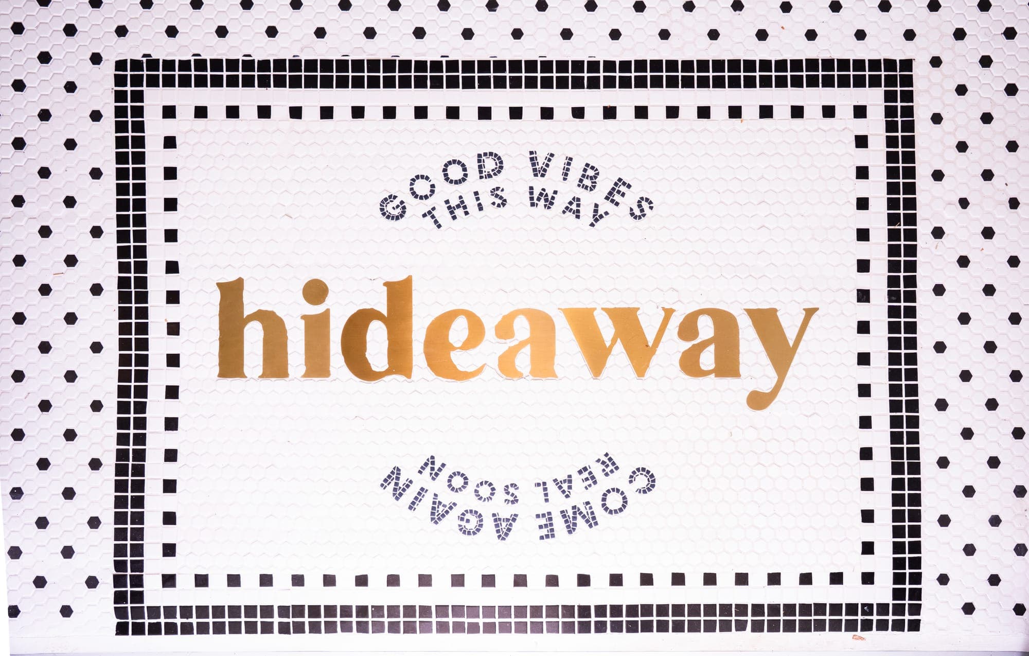 Entrance mosaic: hideaway, good vibes this way